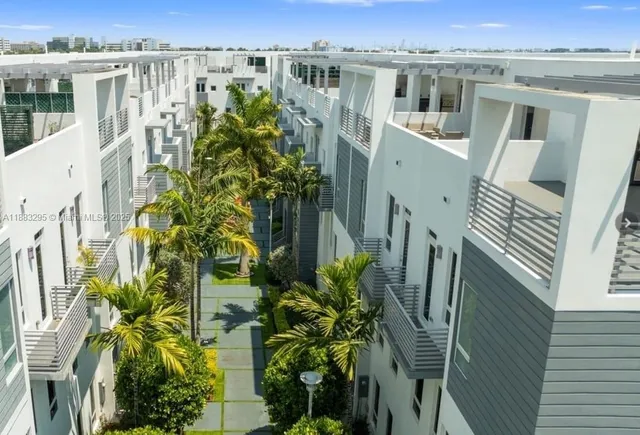 a view of a yard with plants