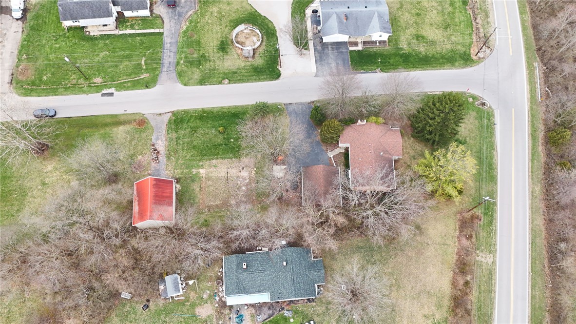 6711 Hamilton-Middletown Road Franklin, OH 45005 - Photo 45 of 49 An aerial view showcases properties nestled among green spaces, offering a sense of rural charm.