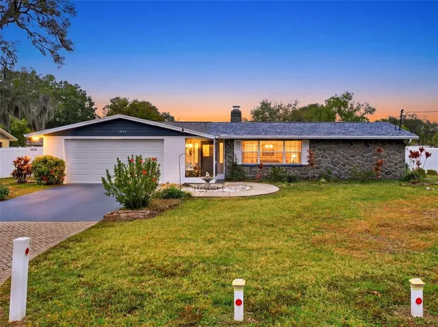 a view of a house with a swimming pool