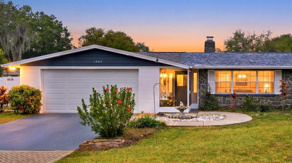 1602 Alder Way Brandon, FL 33510 - Photo 2 of 64 a view of a house with swimming pool and sitting area