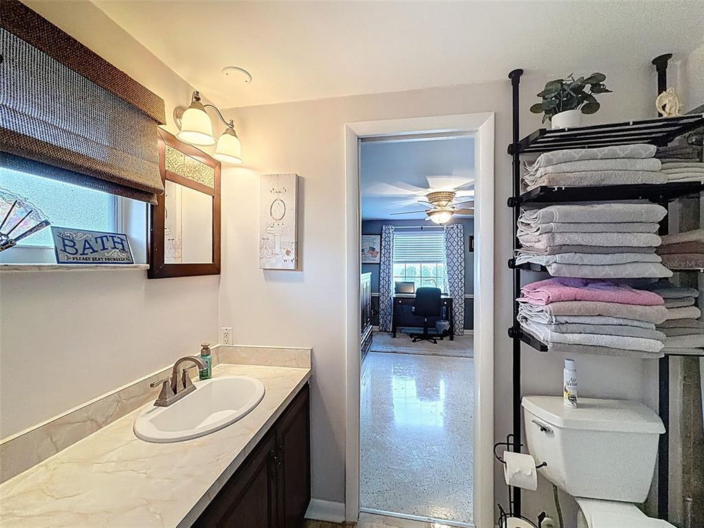 1602 Alder Way Brandon, FL 33510 - Photo 33 of 64 a en suite bathroom with a sink double vanity and a mirror