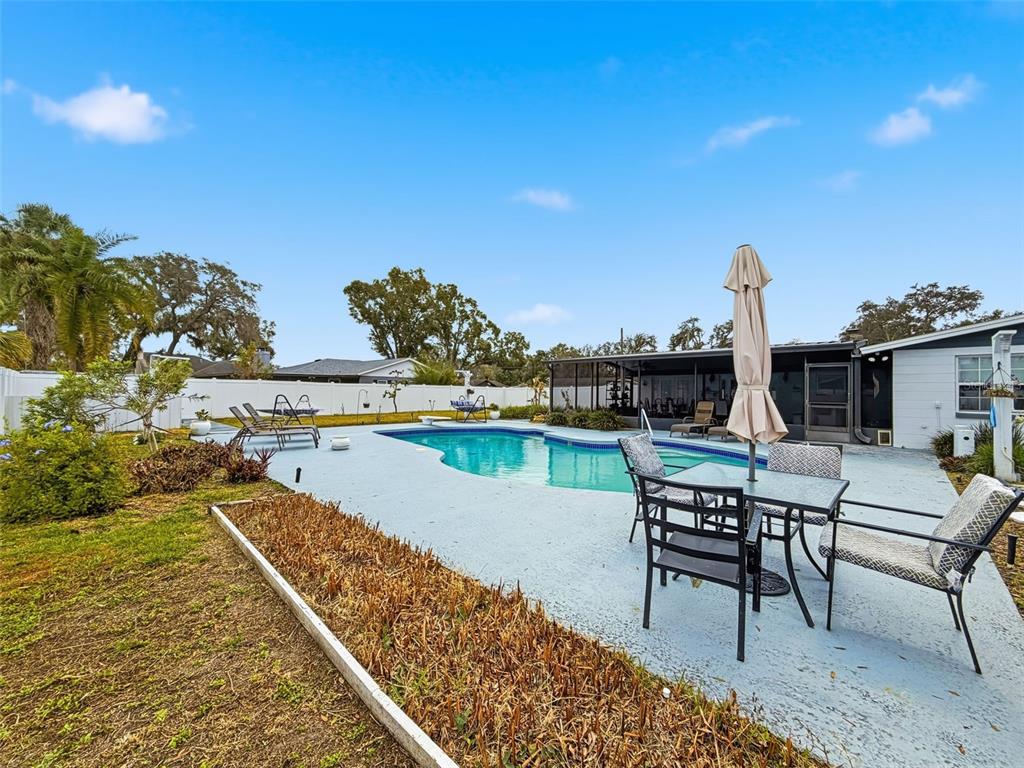 1602 Alder Way Brandon, FL 33510 - Photo 46 of 64 a view of a chairs and table in the terrace