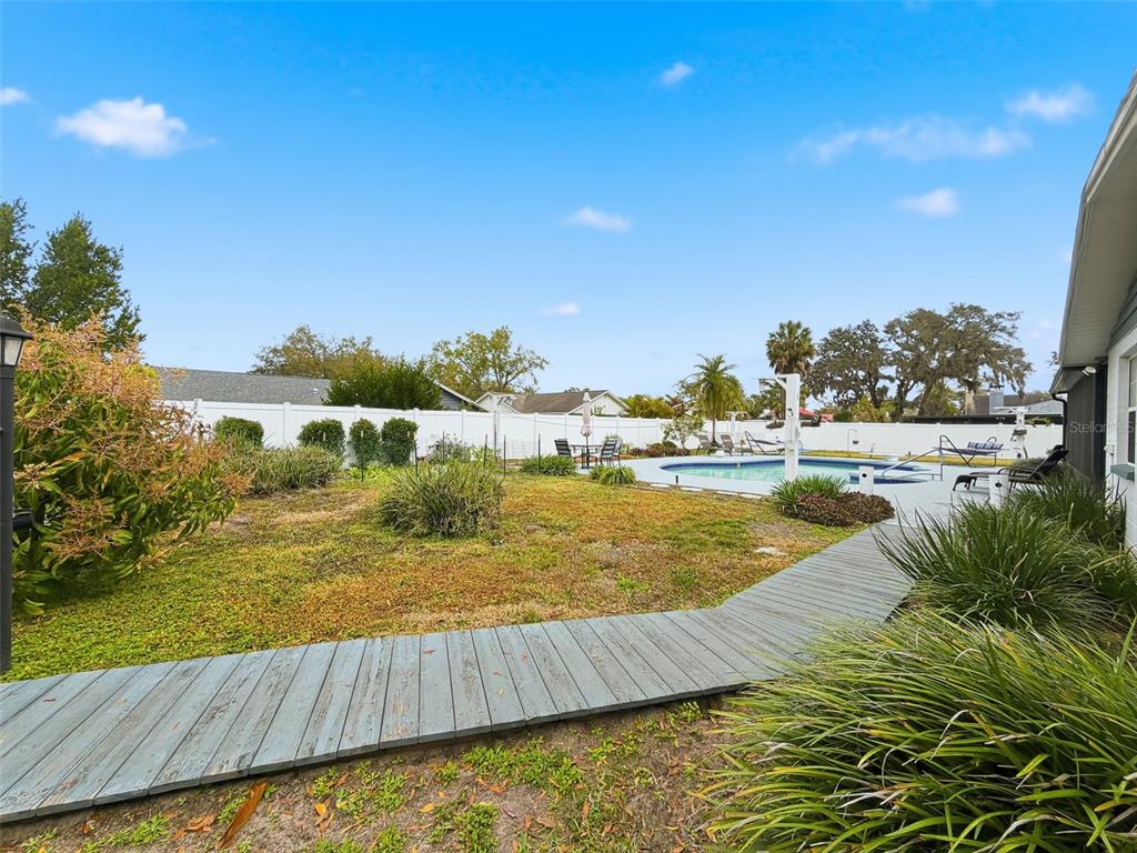 1602 Alder Way Brandon, FL 33510 - Photo 55 of 64 a view of a lake with houses in the back