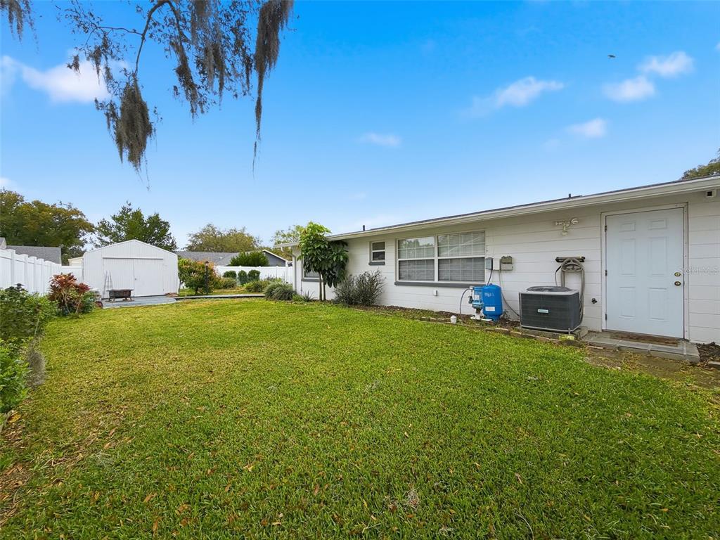 1602 Alder Way Brandon, FL 33510 - Photo 58 of 64 a front view of house with yard and seating area