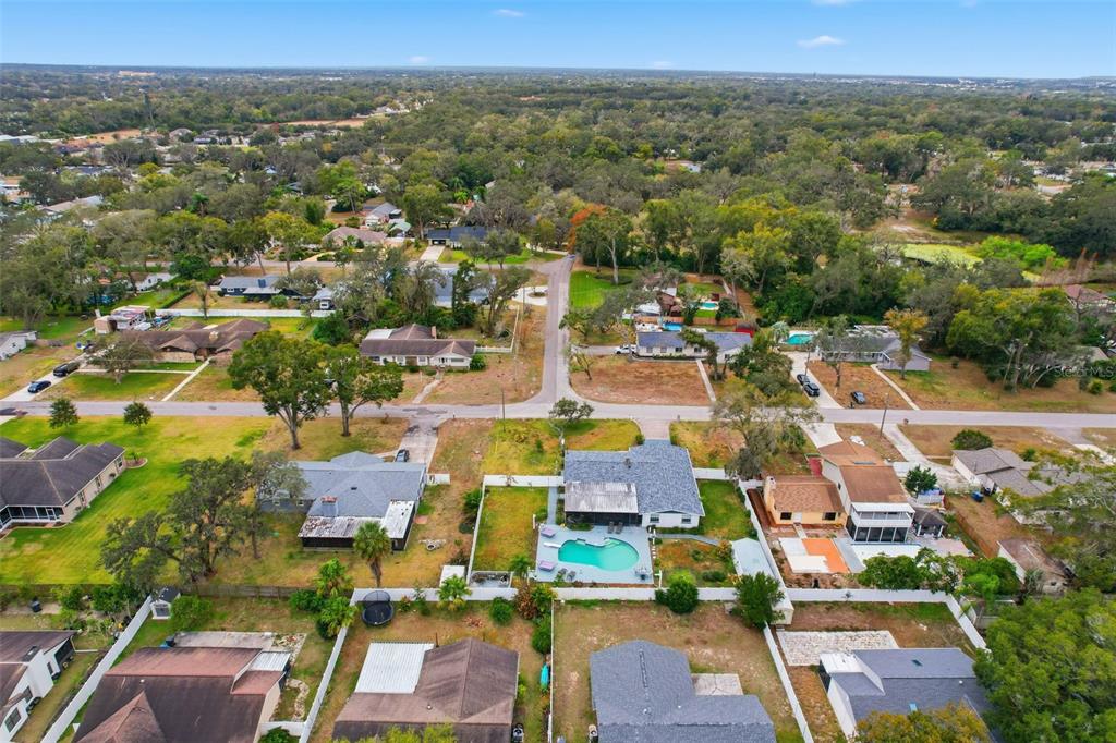 1602 Alder Way Brandon, FL 33510 - Photo 63 of 64 an aerial view of residential houses with outdoor space