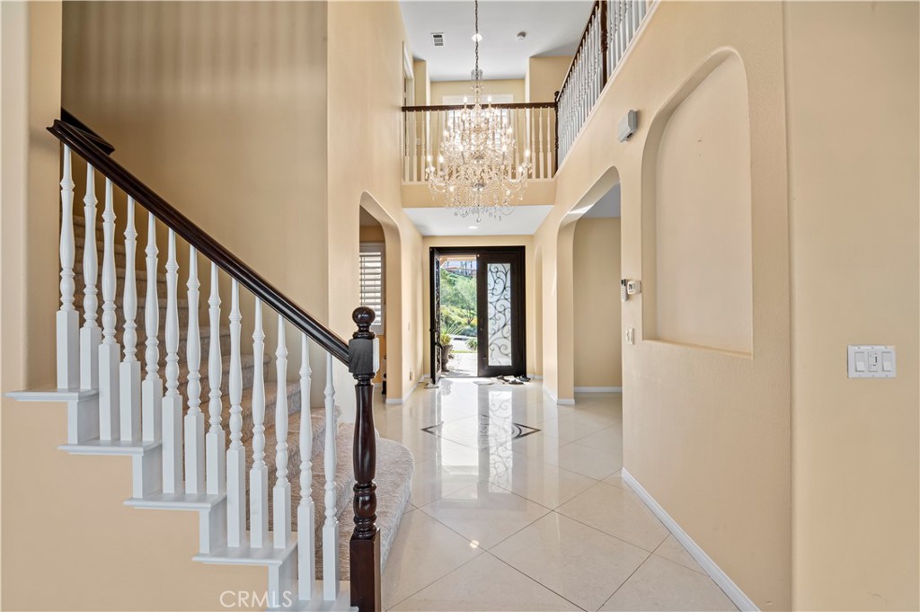 12810 Sierra Creek Drive Riverside, CA 92503 - Photo 40 of 52 a view of entryway and hall with wooden floor