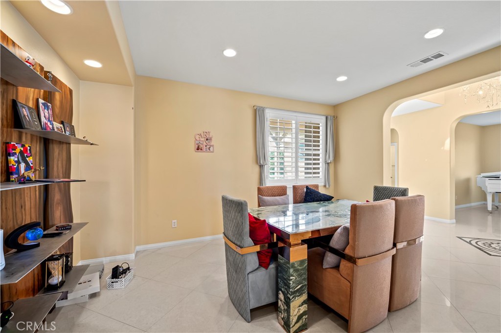 12810 Sierra Creek Drive Riverside, CA 92503 - Photo 47 of 52 a living room with furniture and a window