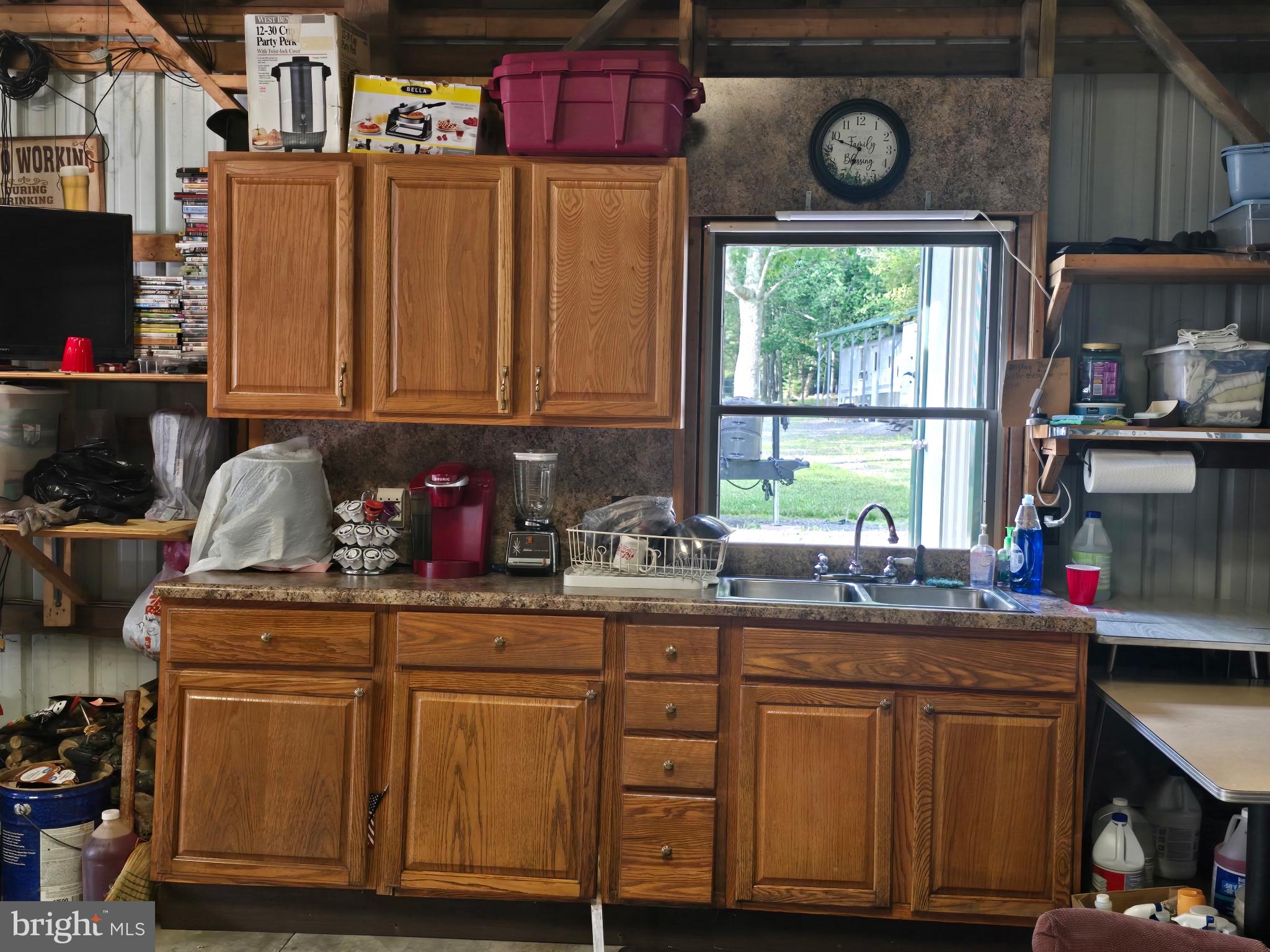 700 Paul Stahl Road Mount Storm, WV 26739 - Photo 28 of 31 Rustic kitchen with wooden cabinetry.