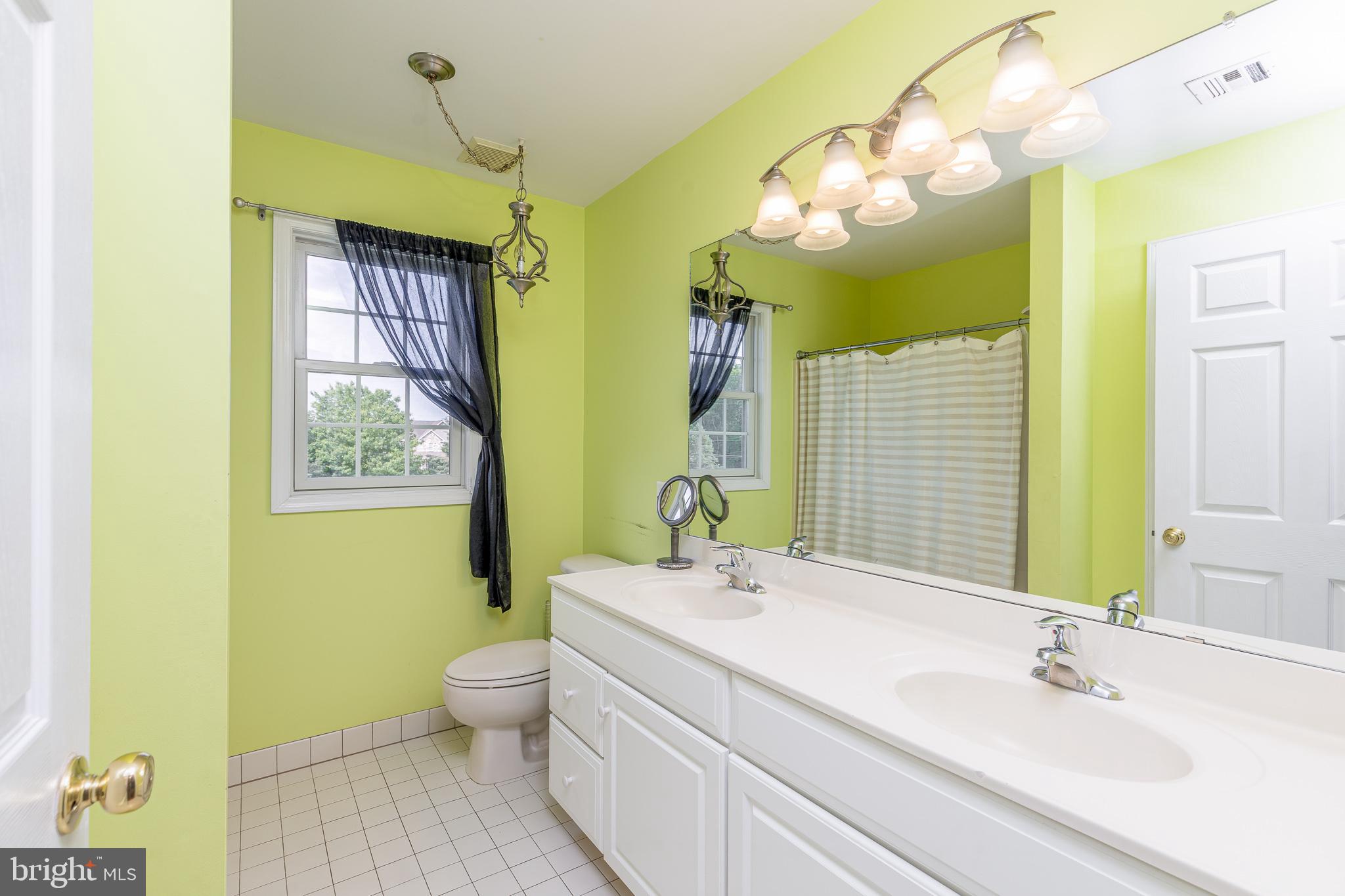 2 Dellaira Court Wrightstown, NJ 08562 - Photo 51 of 93 a bathroom with a double vanity sink mirror and toilet