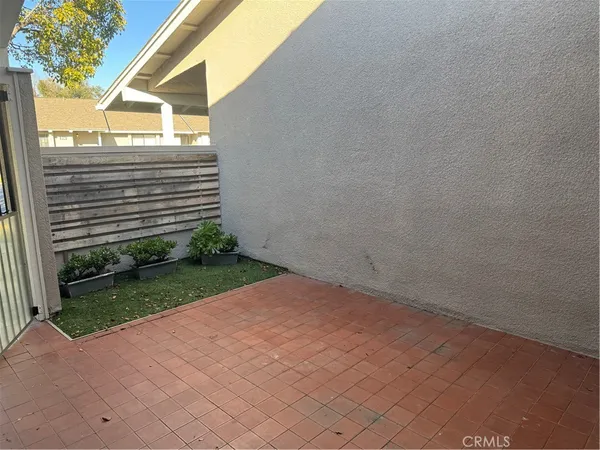 a view of a backyard with a garden