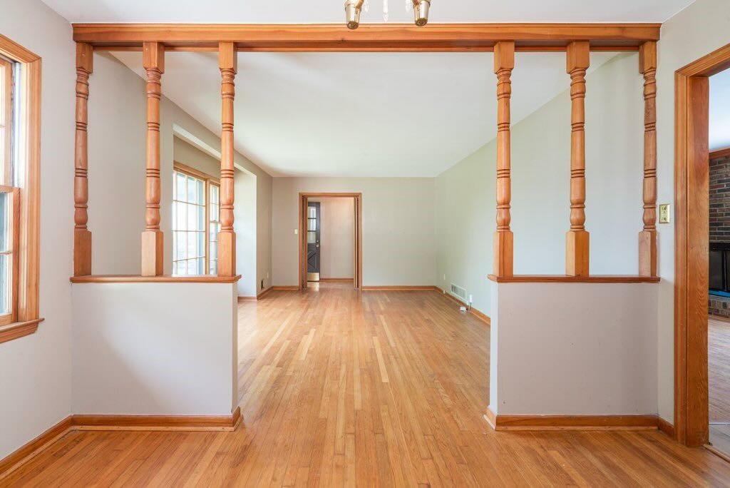 3854 Ridgewood Drive Southeast Smyrna, GA 30080 - Photo 14 of 40 a view of an empty room with wooden floor and a window