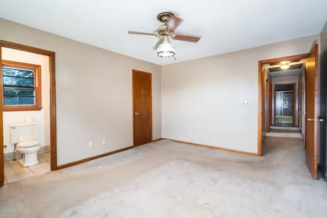 a view of a hallway with closet