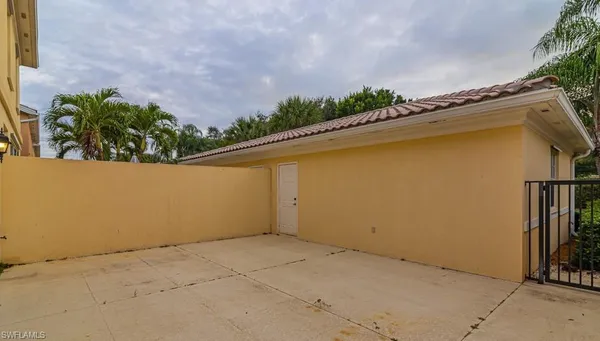 a view of a garage with wooden floor
