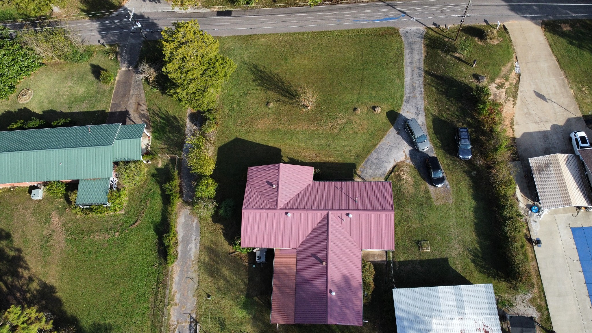 2122 Old Decaturville Road Parsons, TN 38363 - Photo 13 of 37 an aerial view of a houses with outdoor space