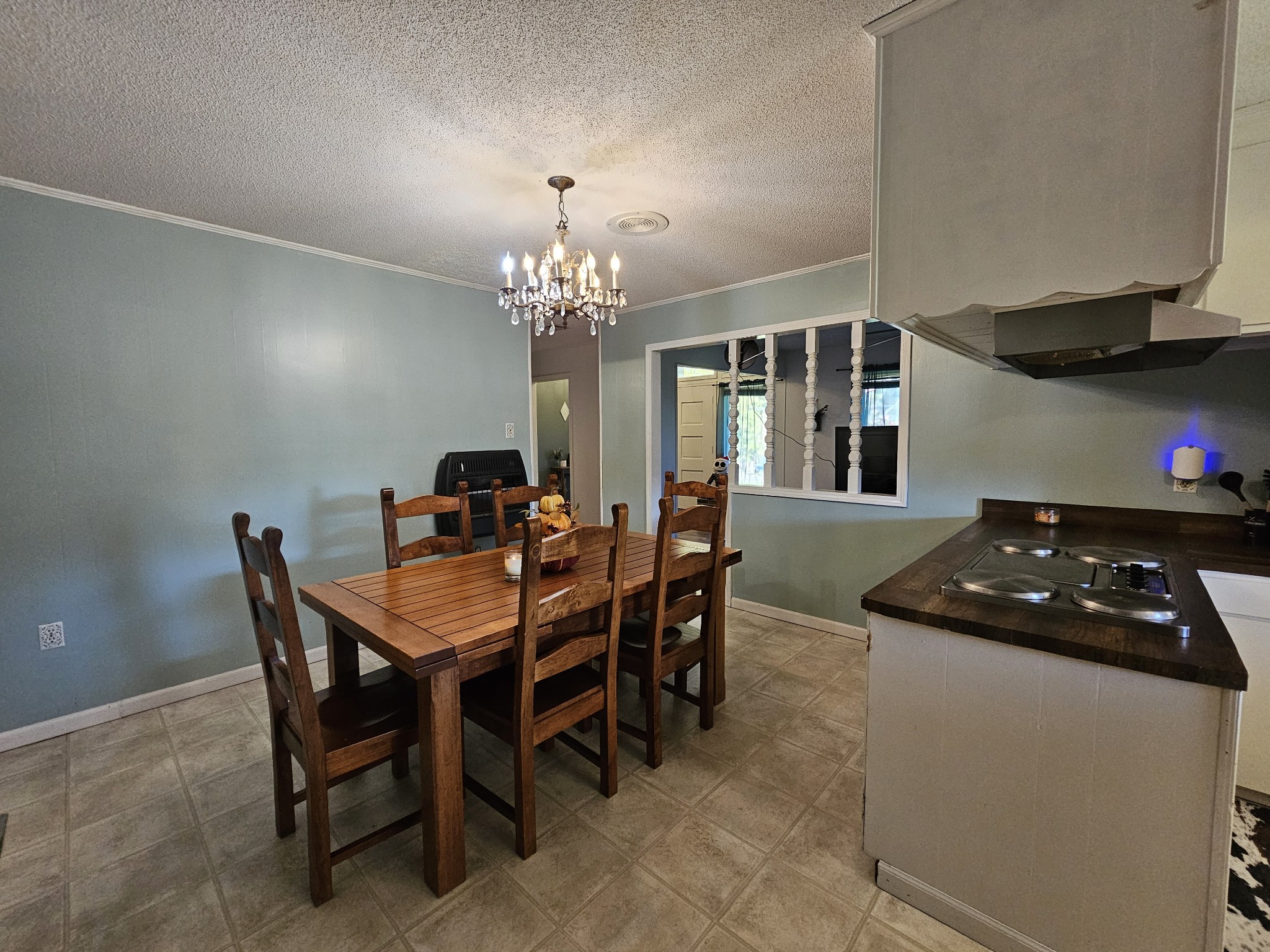 2122 Old Decaturville Road Parsons, TN 38363 - Photo 17 of 37 a kitchen that has a table and chairs in it