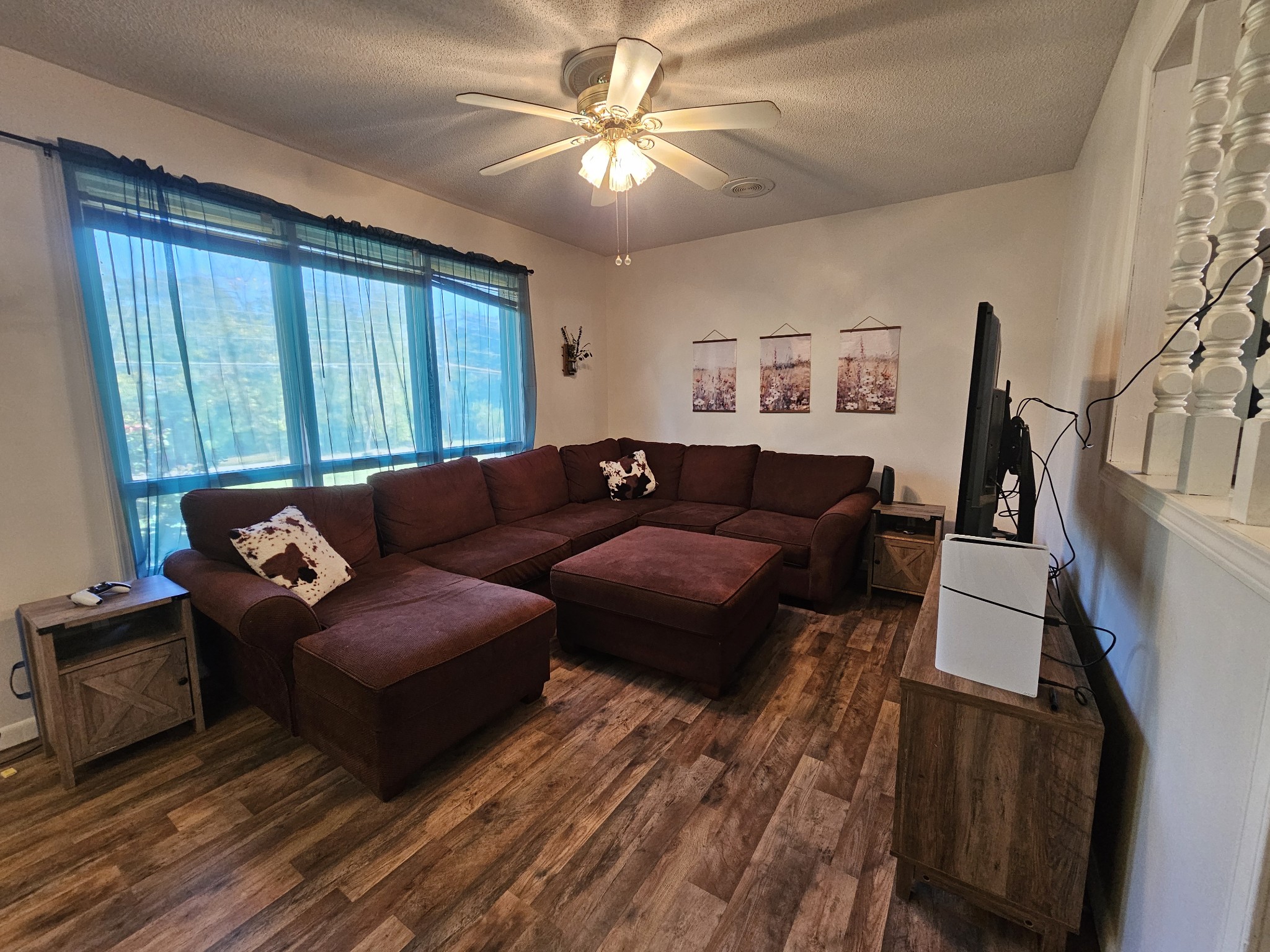 2122 Old Decaturville Road Parsons, TN 38363 - Photo 20 of 37 a living room with furniture and a large window