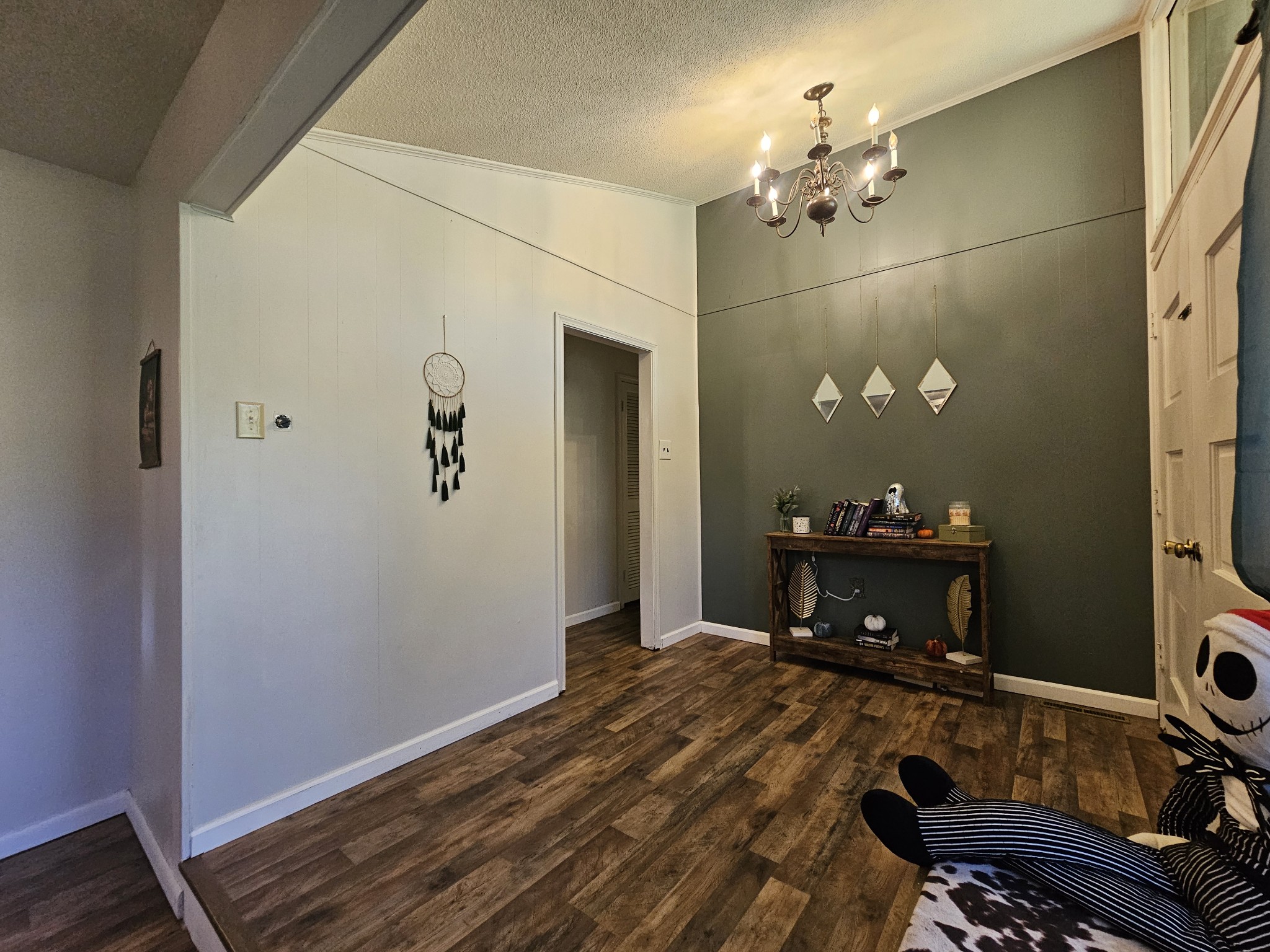 2122 Old Decaturville Road Parsons, TN 38363 - Photo 22 of 37 a room with a mirror and furniture