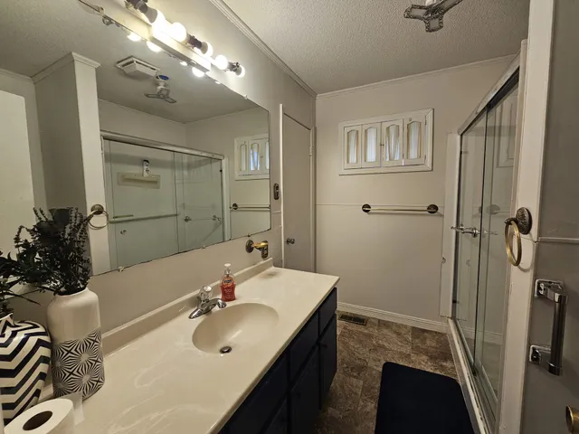 a bathroom with a shower and a toilet