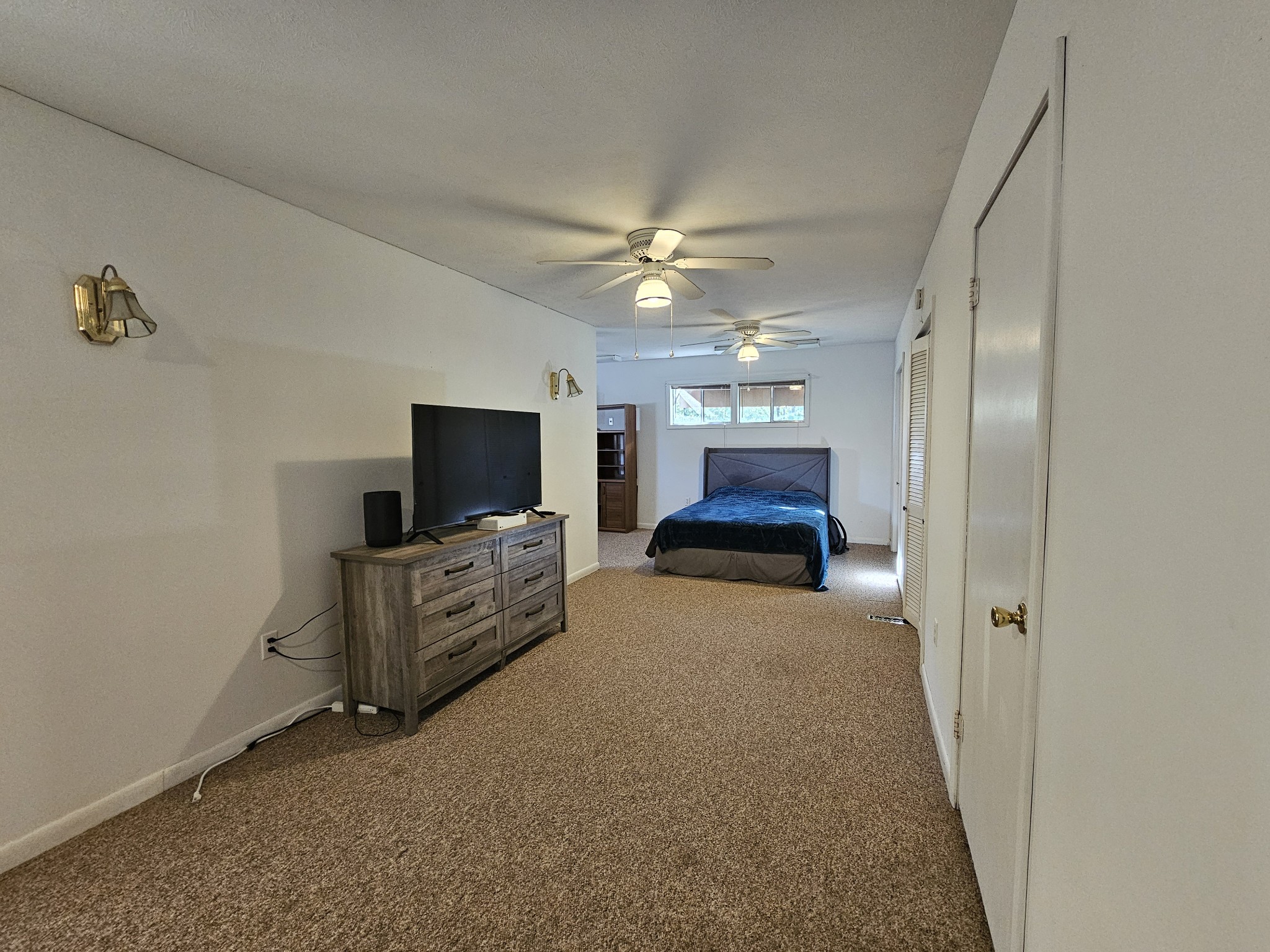 2122 Old Decaturville Road Parsons, TN 38363 - Photo 31 of 37 a living room with furniture and a flat screen tv