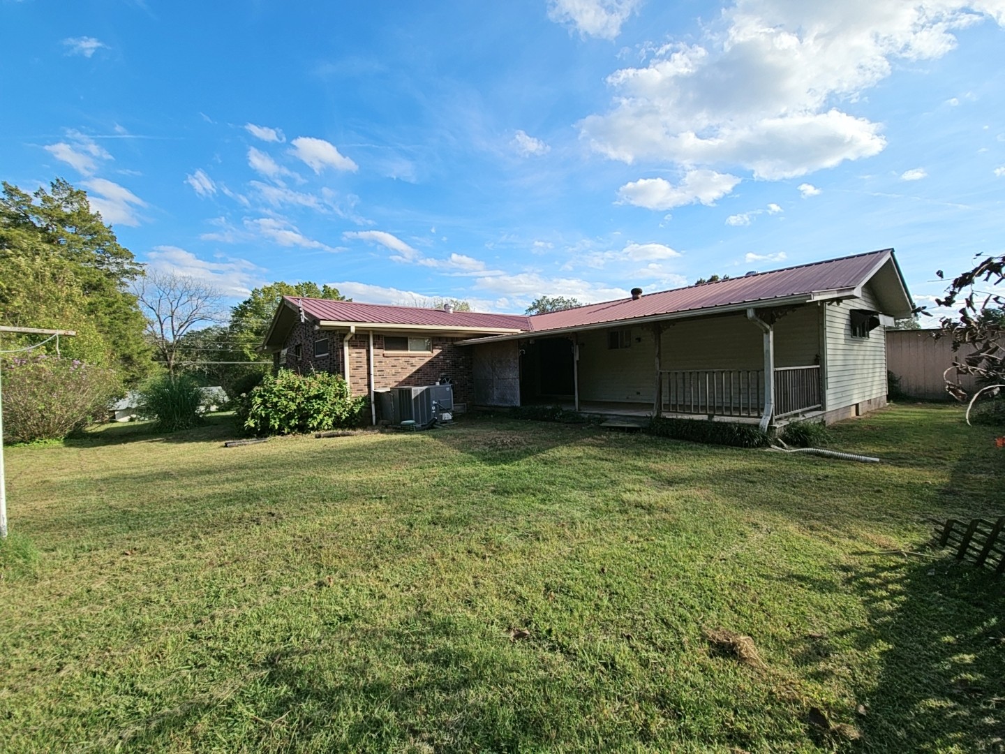2122 Old Decaturville Road Parsons, TN 38363 - Photo 8 of 37 a front view of a house with a yard