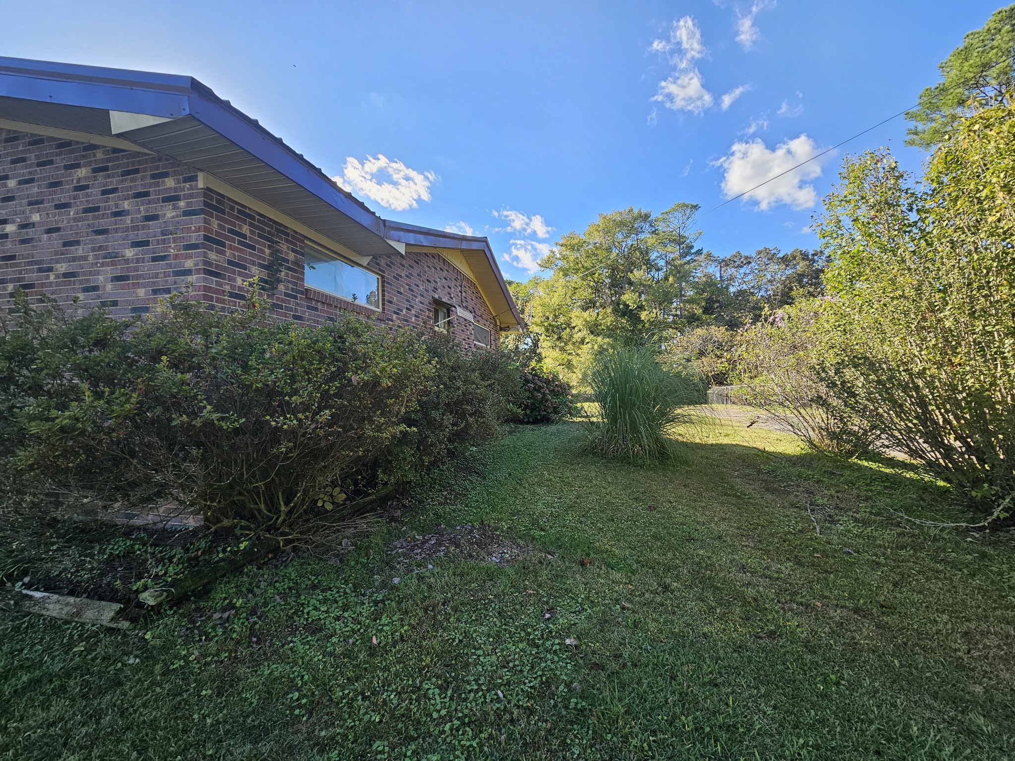 2122 Old Decaturville Road Parsons, TN 38363 - Photo 10 of 37 a view of a house with a yard
