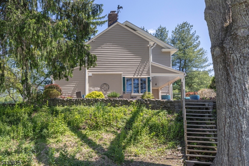 449 Stamets Road Milford, NJ 08848 - Photo 5 of 44 a front view of a house with a yard