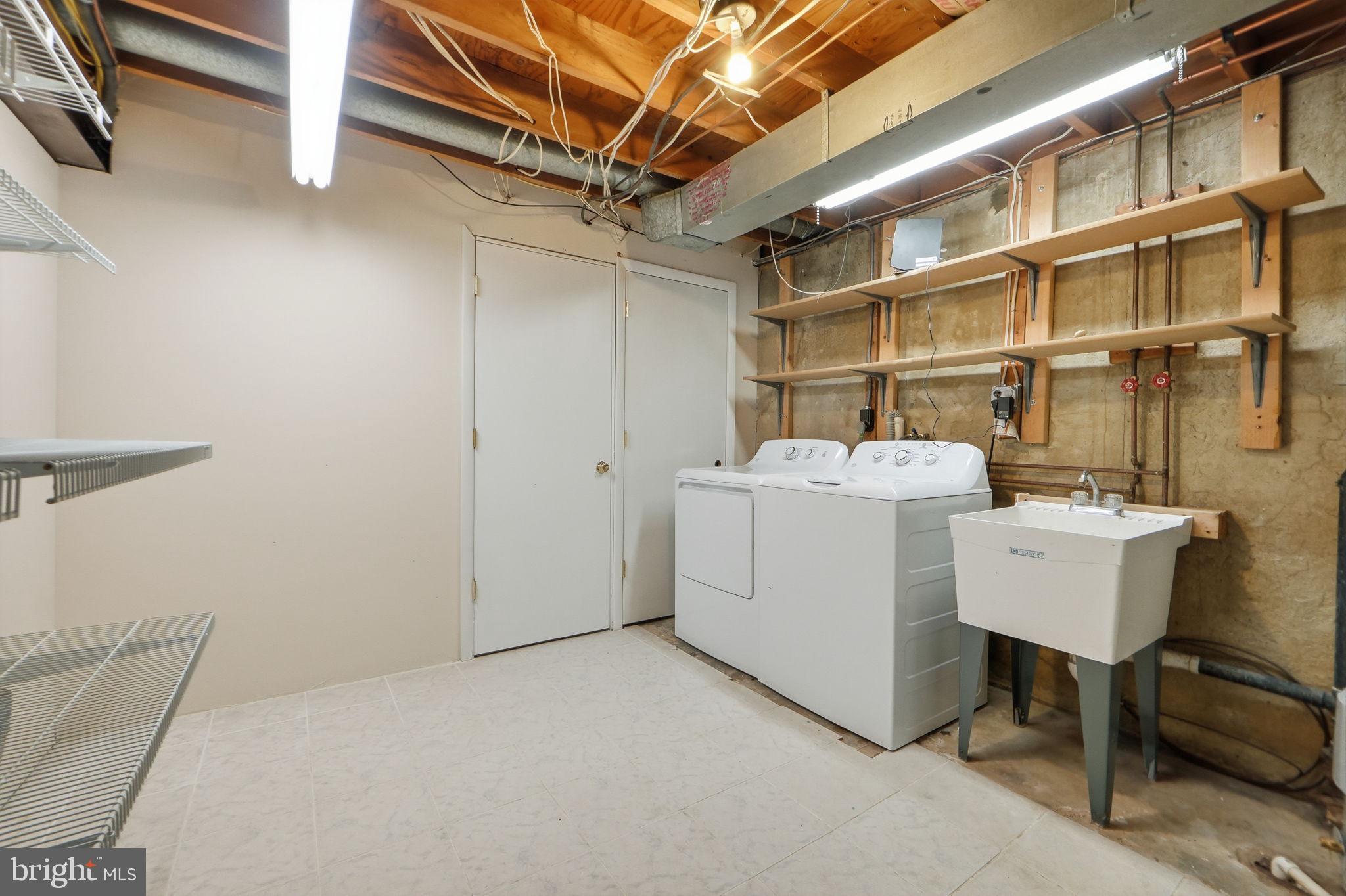 14204 Piccadilly Road Silver Spring, MD 20906 - Photo 35 of 42 Laundry Room w/storage