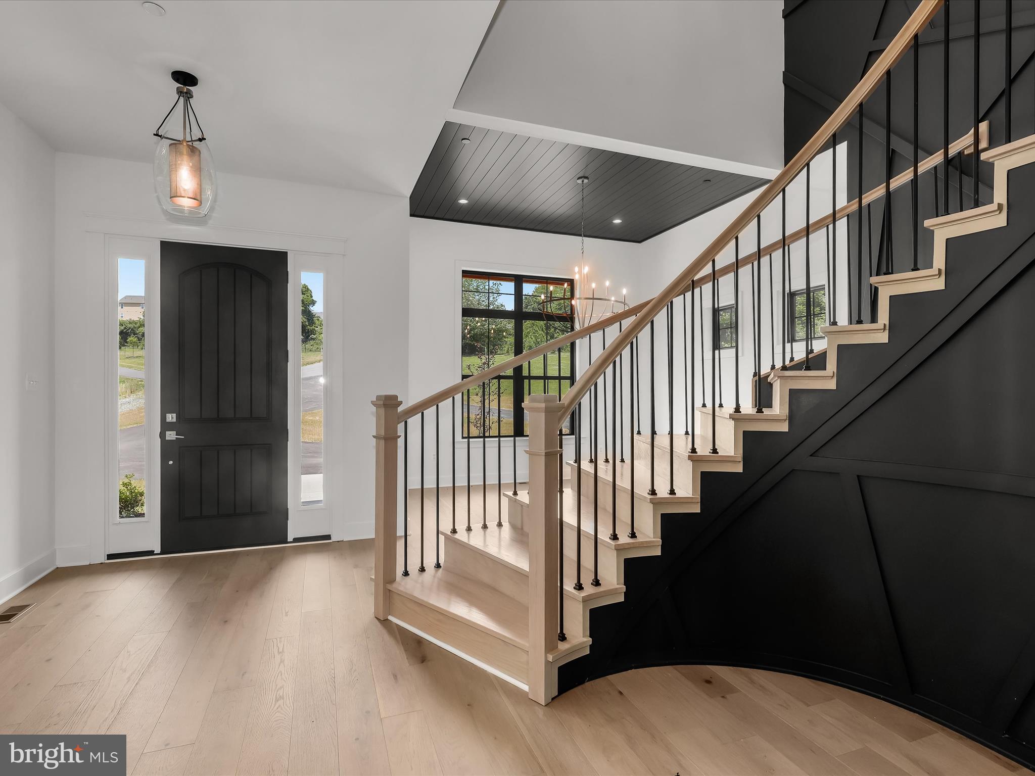 2505 Triumph Road Finksburg, MD 21048 - Photo 72 of 114 Entry and Curved Stair Landing Area