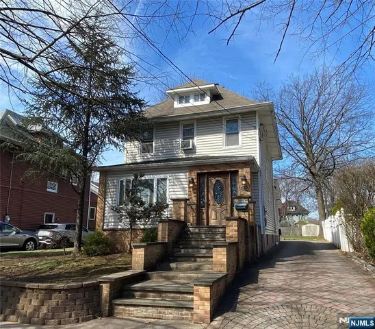 a front view of a house with a porch