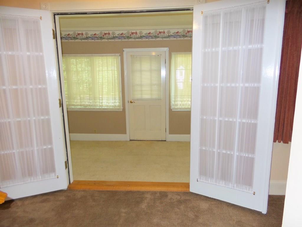 54 River Road Benton, ME 04901 - Photo 16 of 35 French doors lead to the front...