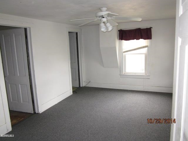 2405 North Henderson Road Freeport, IL 61032 - Photo 15 of 25 an empty room with windows and fan