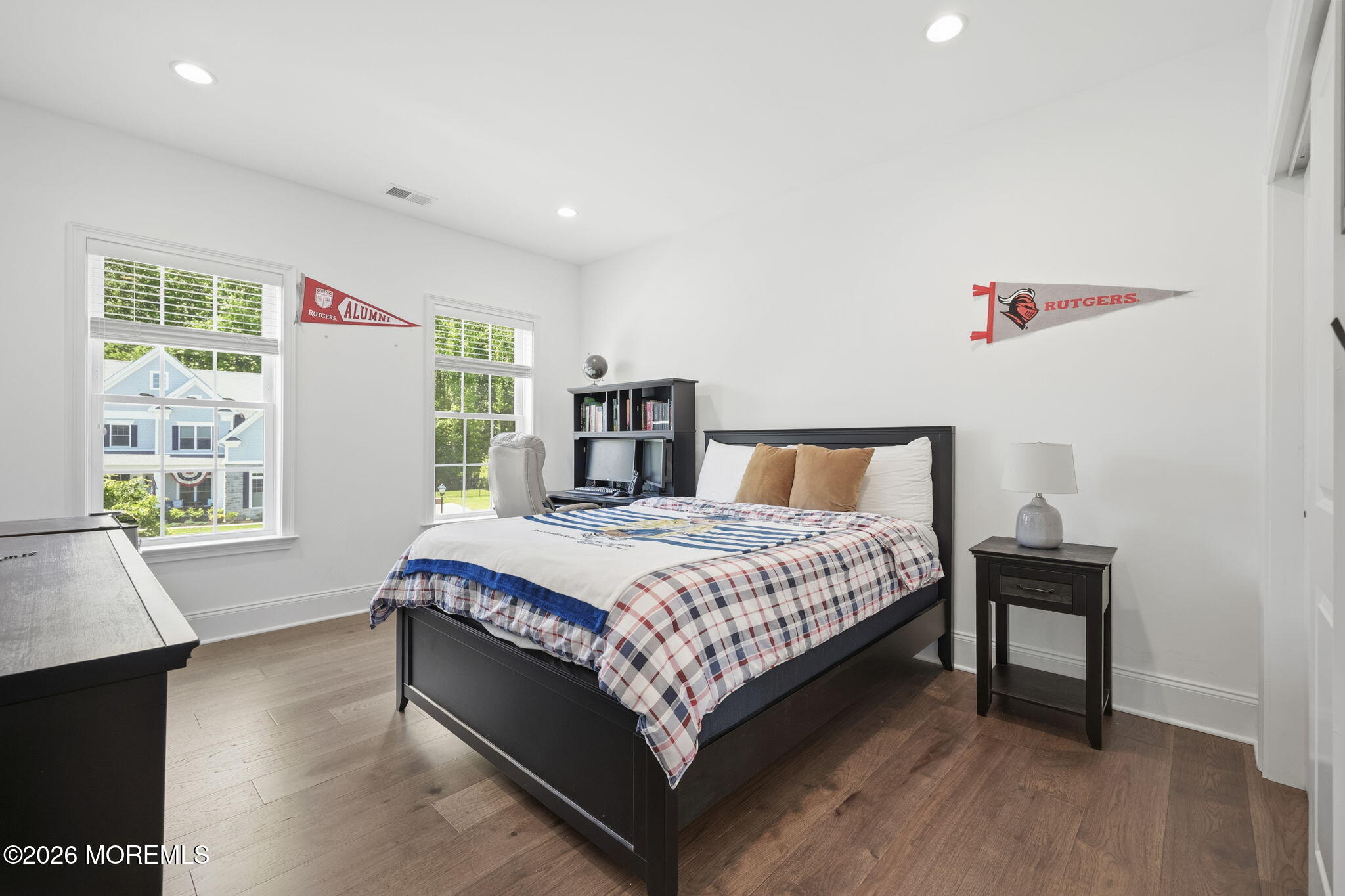 66 Windermere Road Lincroft, NJ 07738 - Photo 28 of 48 a bed sitting in a bedroom next to a window