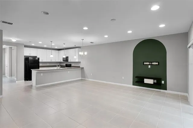 a view of a livingroom with a furniture