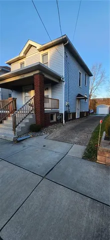 a view of a house with garage