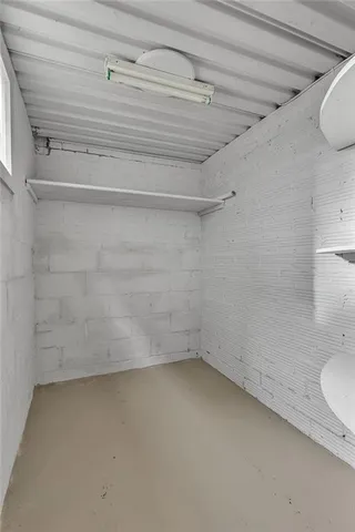 a view of a room with racks on the wall