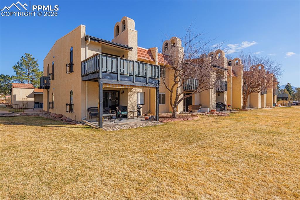 1018 Fontmore Road, Unit C Colorado Springs, CO 80904 - Photo 22 of 33 a view of a building with a swimming pool