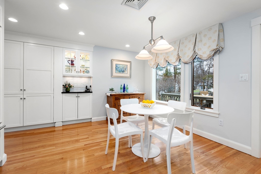 81 Woodfall Road Belmont, MA 02478 - Photo 13 of 37 a view of a dining room with furniture window and wooden floor
