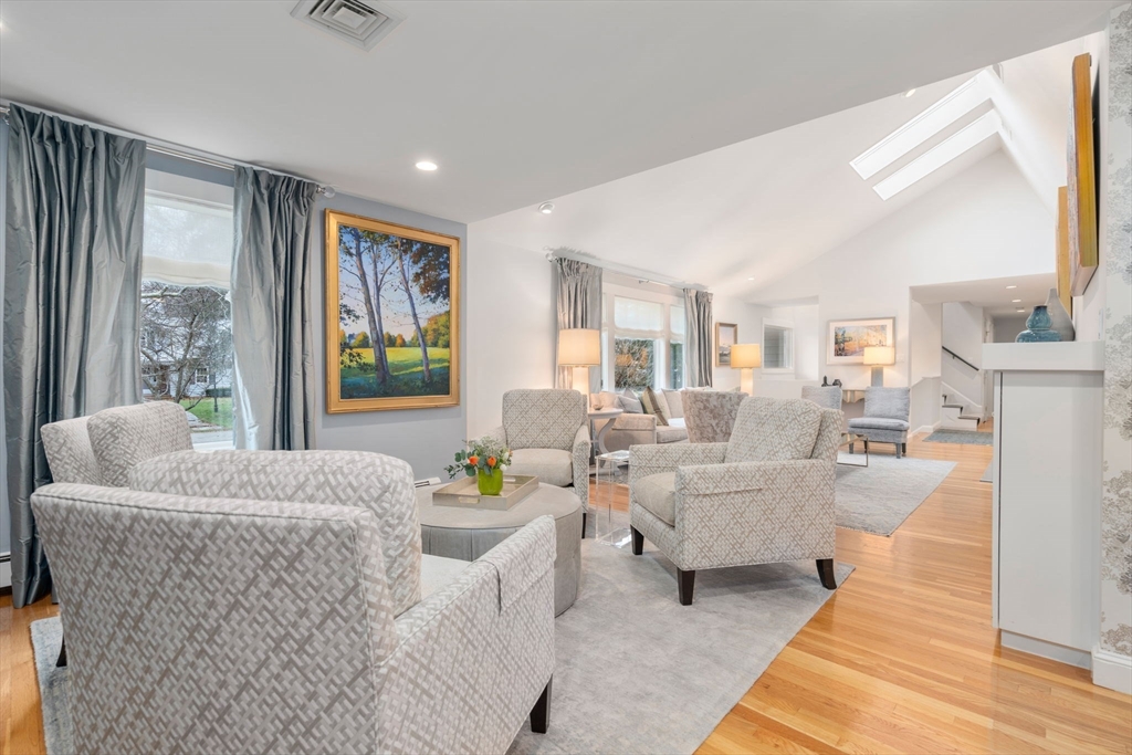 81 Woodfall Road Belmont, MA 02478 - Photo 5 of 37 a living room with furniture and a large window