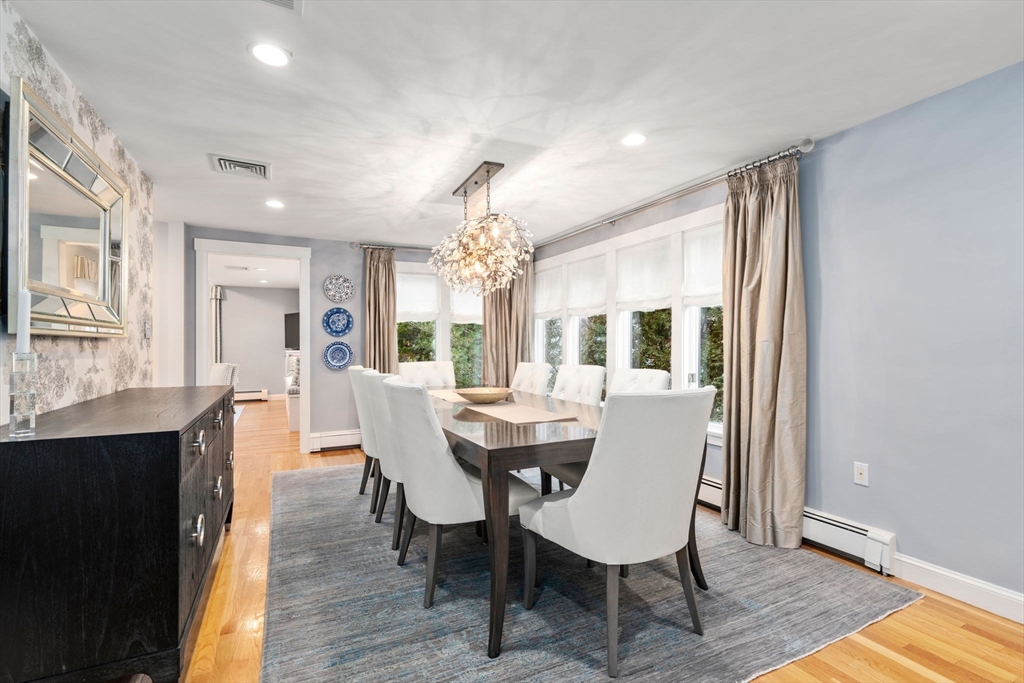 81 Woodfall Road Belmont, MA 02478 - Photo 6 of 37 a dining room with furniture window and wooden floor