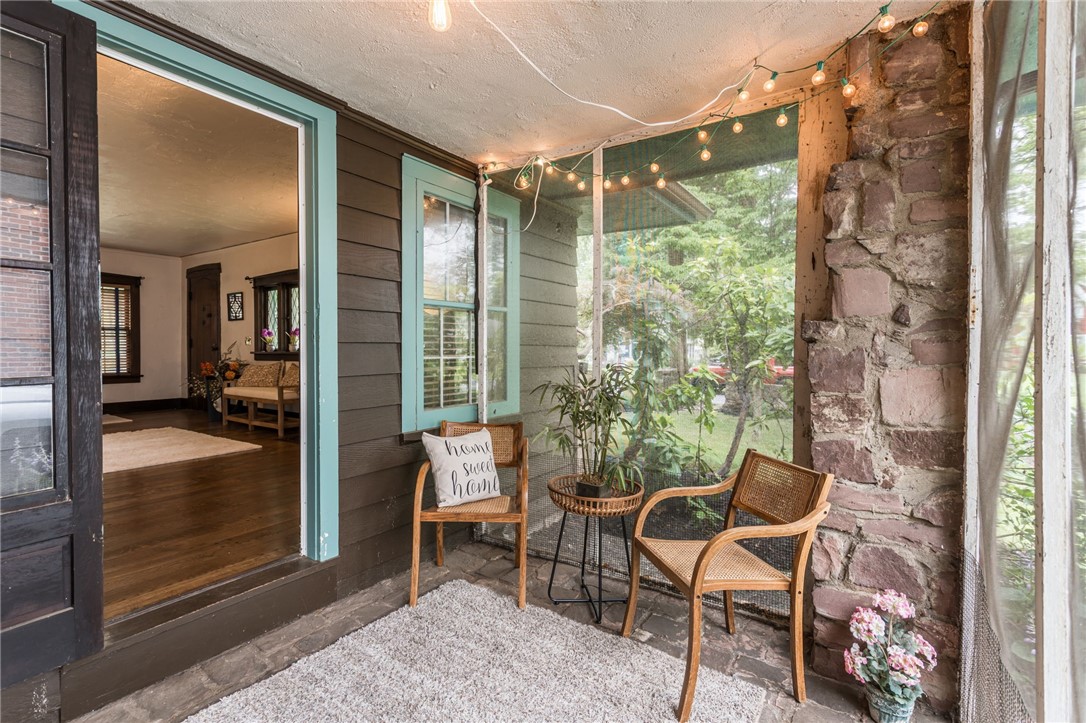 36 Hathaway Road Irondequoit, NY 14617 - Photo 6 of 19 Adorable screened-in porch off living room/great r