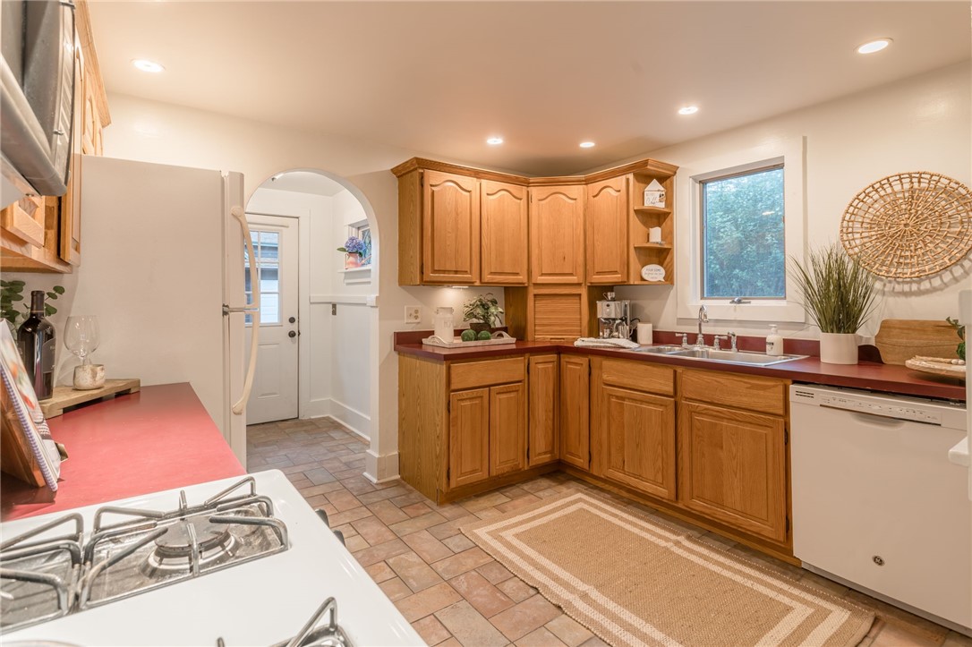 36 Hathaway Road Irondequoit, NY 14617 - Photo 9 of 19 Light and airy full kitchen with gas range and ove