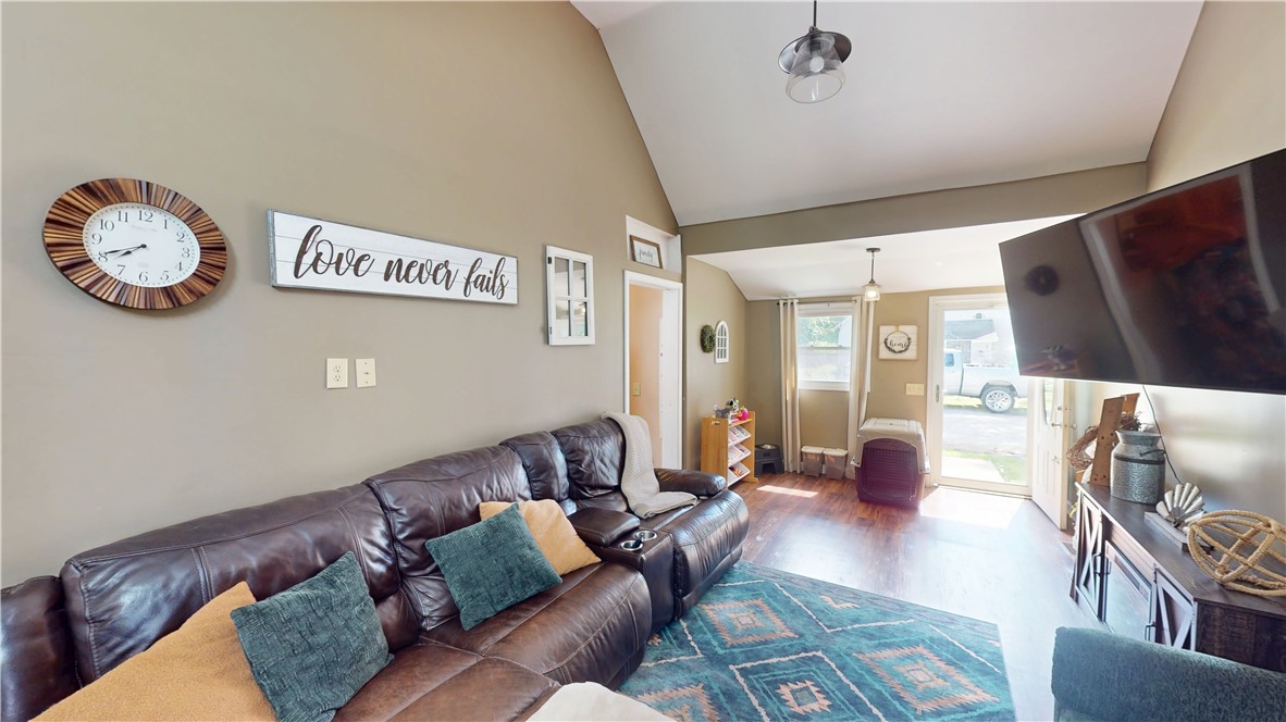 8 Chestnut Street Danville, IL 61832 - Photo 4 of 19 a living room with furniture and a flat screen tv