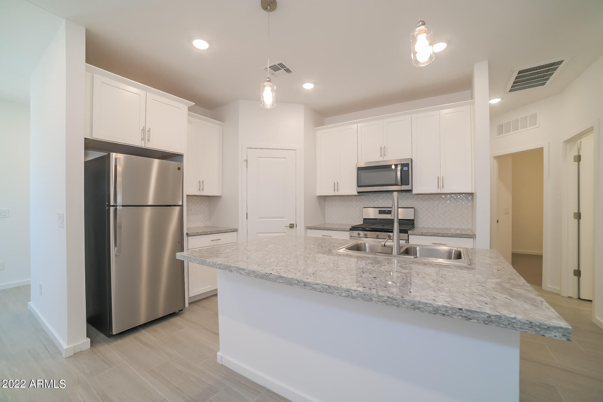 22686 North Chase Drive Maricopa, AZ 85138 - Photo 6 of 17 006-photo-kitchen-11234161