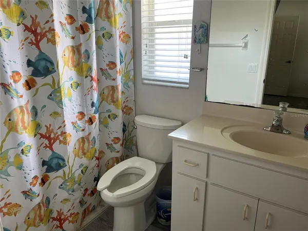 a bathroom with a sink and a toilet