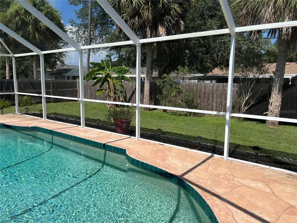 a view of outdoor space with backyard