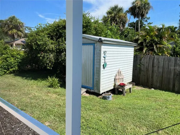 a view of a backyard with a garden