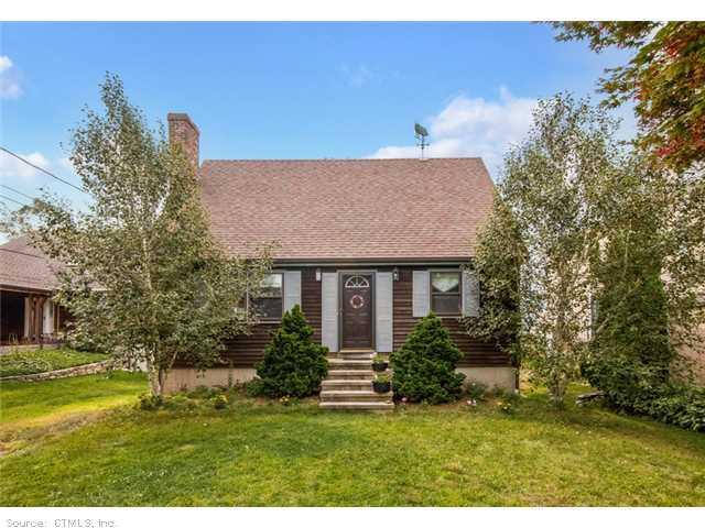8 South Parkway Clinton, CT 06413 - Photo 1 of 1 a front view of house with yard and green space