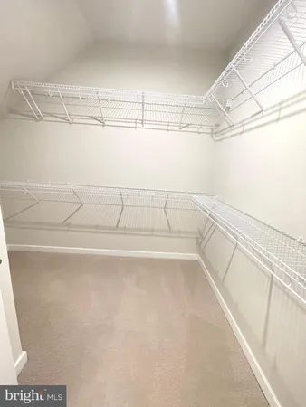 a view of a room with racks on the wall