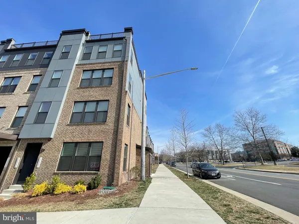 a front view of a building with street view