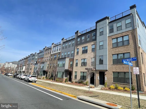 a view of a street with cars